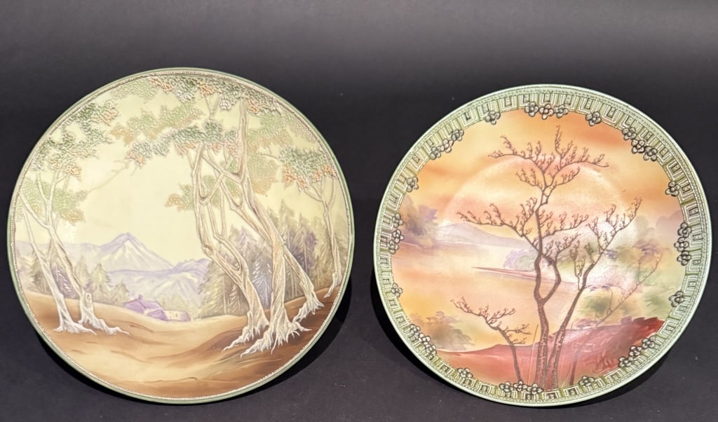 2 Nippon Moriage Scenic Wall Plaques: Landscape trees mountains and house dia. 10"Sunset rvierscape with trees and mountains dia. 9.5"The Estate of the late Judy Boyd, New Jersey.STERLING ASSOCIATES STRIVES TO PROVIDE ACCURATE, OBJECTIVE,