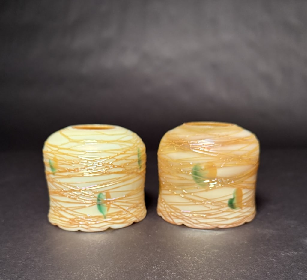 2 Quezal Threaded Hearts And Vines Shades: 2 Quezal threaded hearts and vines art glass shades. Bell form fitterless shallow glass shade. Gold interior.3 1/8" H. 3 1/2" W. 1 3/8" Approx. fitter opening. The Estate of the late Judy Boyd, New Je