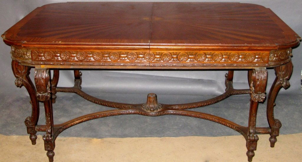 Dining Room Table, circa 1910: Carved parquetry and inlay dining table, circa 1910 additional 2 leaves. veneer slightly damaged around edges Height 32", Length 70", Width 44" Leaves: length 44", width 14 1/2"