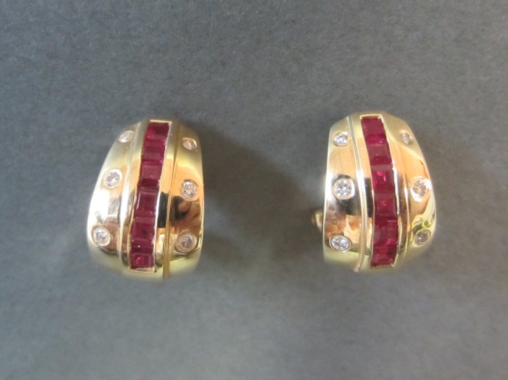 14Kt Diamond & Ruby Earrings: 14Kt diamond & ruby earrings w/ omega backs. Height: 5/8" approx total weight 7 grams