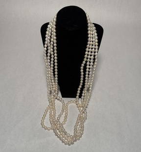 Collection Of 4 Pearl Necklaces: 4 pearl necklaces with yellow gold clasps marked 14K. Length approx. 36". Bead dia. approx. 9.0-10.0mm.STERLING ASSOCIATES STRIVES TO PROVIDE ACCURATE, OBJECTIVE, & FAIR INFORMATION ON ALL LOTS. WE