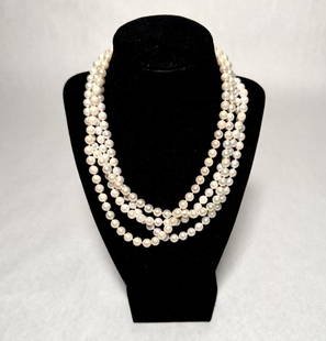 Collection Of 4 Pearl Necklaces: 4 pearl necklaces with yellow gold clasps marked 14K. Length approx. 18". Bead dia. approx. 7.3mm.STERLING ASSOCIATES STRIVES TO PROVIDE ACCURATE, OBJECTIVE, & FAIR INFORMATION ON ALL LOTS. WE WILL