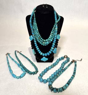 Collection Of 11 Turquoise Necklaces: Turquoise and onyx beaded necklaces with sterling silver clasps. Marked 925. Length approx 2@16", 5@16.5" 17", 17.5", 19.5" and 23". Beads dia. approx. 5.0-32.4mm.STERLING ASSOCIATES STRIVES TO