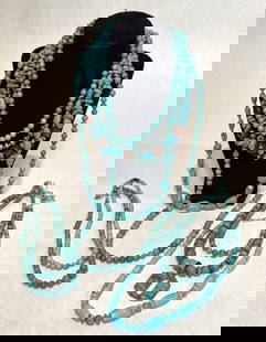 Collection Of 10 Turquoise Necklaces: Turquoise beaded necklaces with sterling silver clasps. Marked 925.Legnth approx. 2@16", 2@16.5", 2@17", 17.5", 18", 27", and 35".Pendant 1.4" x 1.3".Beads dia. approx. 4.2-15.7mm.STERLING ASSOCIATES