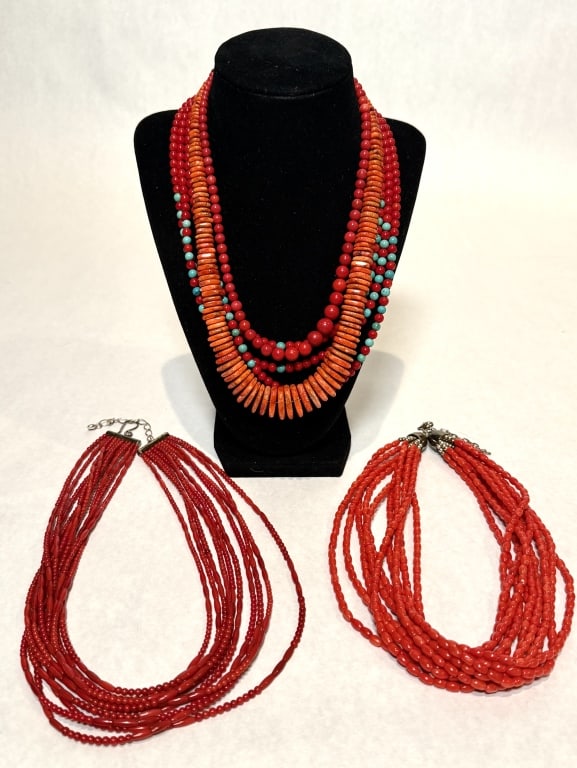 Collection Of 5 Coral Necklaces: Coral beaded necklaces with sterling silver clasps. Marked 925. Lengths approx. 1@17", 4@ 18". Beads dia. approx. 3.5mm-17mm.STERLING ASSOCIATES STRIVES TO PROVIDE ACCURATE, OBJECTIVE, & FAIR INFORMAT