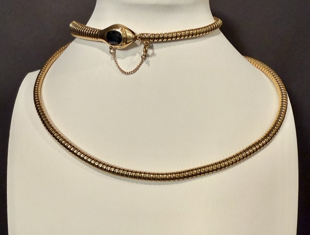18K Long Gas Pipe Style Snake Necklace/Bracelet: Approx. dimensions 30". Tested 18K. Approx. gross weight 73.3 grams.STERLING ASSOCIATES STRIVES TO PROVIDE ACCURATE, OBJECTIVE, & FAIR INFORMATION ON ALL LOTS. WE WILL BE HAPPY TO ANSWER ANY QUESTIONS