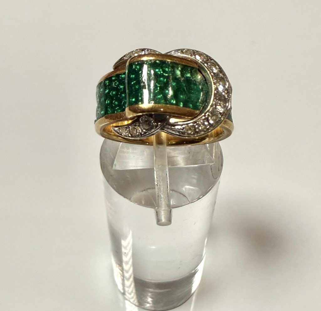 18K Gold, Diamond And Enamel Belt Form Ring: Ring size 6. Tested 18K. Approx. gross weight 9.7 grams. STERLING ASSOCIATES STRIVES TO PROVIDE ACCURATE, OBJECTIVE, & FAIR INFORMATION ONALL LOTS. WE WILL BE HAPPY TO ANSWER ANY QUESTIONS AND PROVIDE