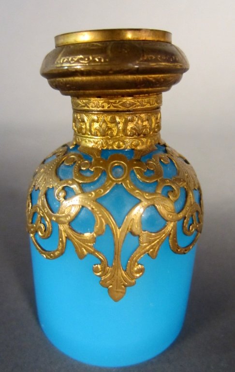 Opaline Blue Glass Perfume Bottle: Antique French opaline blue glass perfume bottle . Painting under glass on top. Height: 3", Width: 2 3/4"