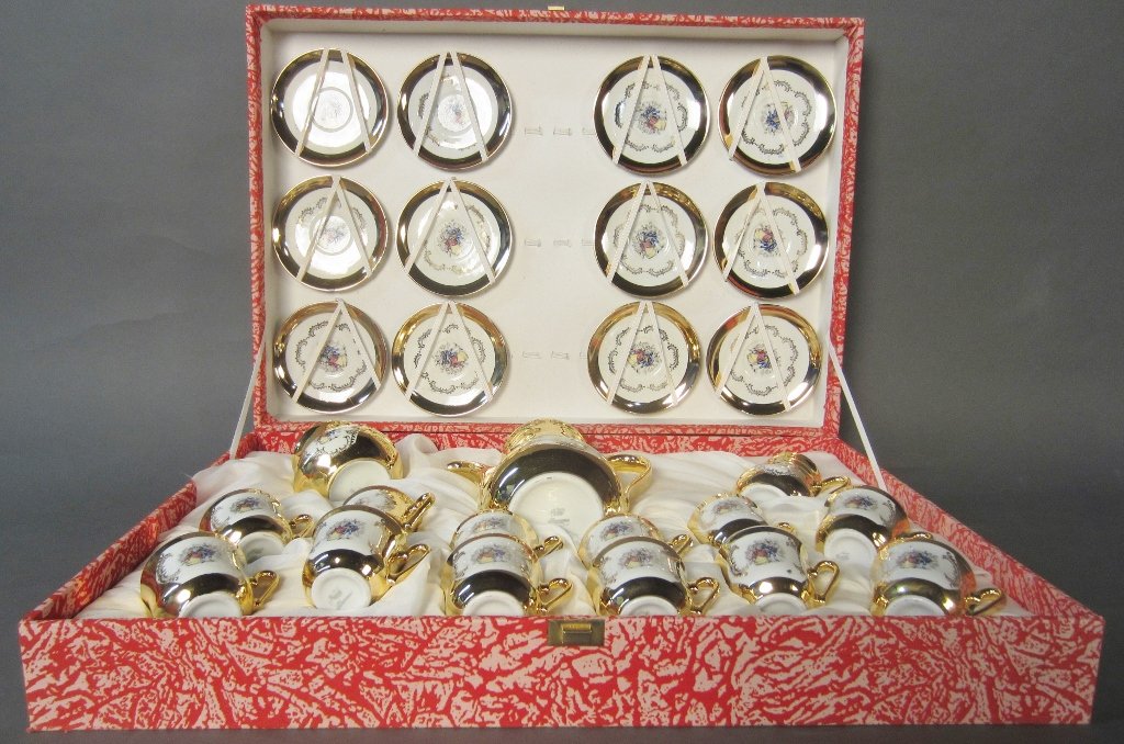 Demitasse Tea Set: Demitasse tea set in fitted case. Maker's mark on bottom. 1 noticeable chip on plate.