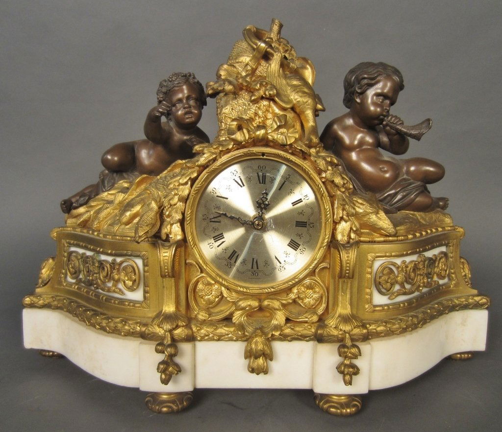 Patinated & Dore over Bronze and Marble Clock: Henri Picard, French (1840-1890) Louis XVI style/ Napoleon III style patinated and dore over bronze & marble clock. Signed: H.Picard. Movement replaced with battery operated movement.