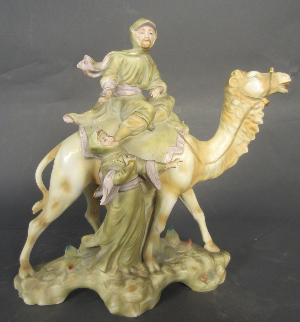 Royal Dux Figural Vase: Royal Dux, Figures & camel vase. Old repair to woman's hand. AS IS Height: 10", Width: 10"
