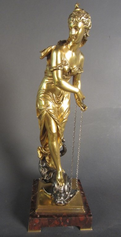 Eutrope Bouret, French(1833-1906): Eutrope Bouret (France, 1833-1906) Dore and silver over bronze figural sculpture. signed: Bouret. 19th Century French Height: 18", Width: 5 1/4"