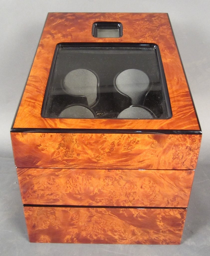 Watch Winder: Watch winder and holder. Top opens to hold and wind 4 watches and drawer able to hold 8 watches Height: 14 1/2", Width: 10"