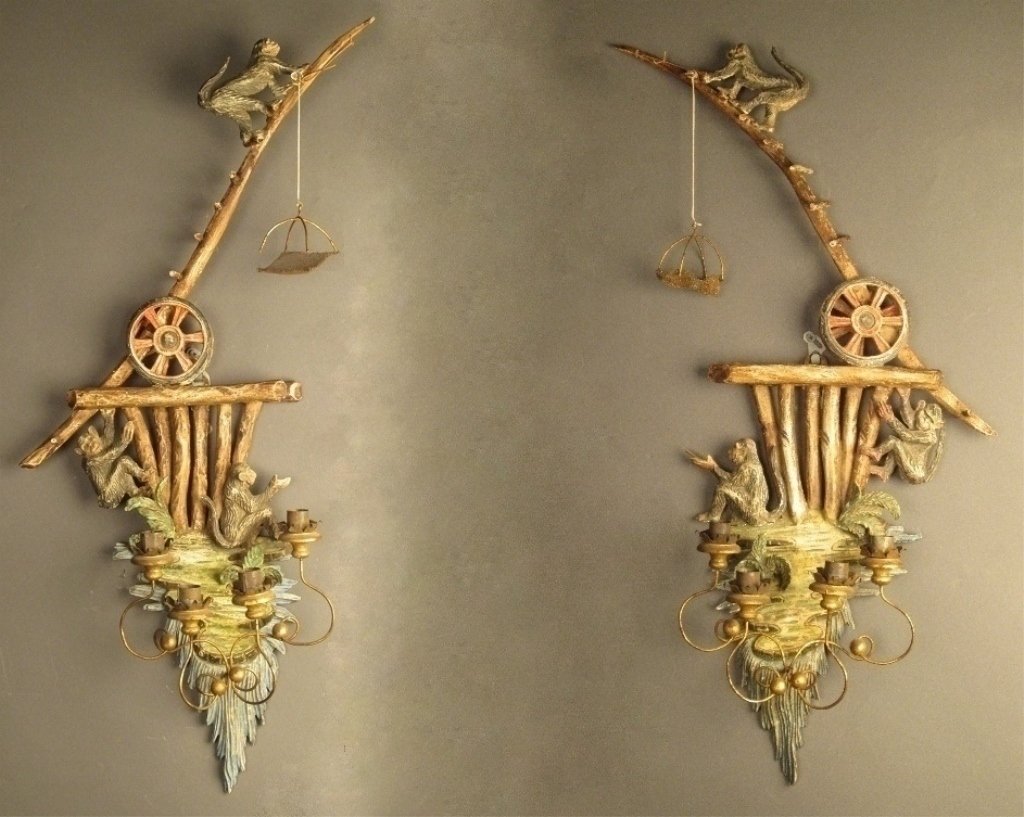 Pair Carved Wood Figural Sconces: Pair of carved wood figural sconces with playful monkeys. Some damages and old repairs. Height: 34", Width: 18"