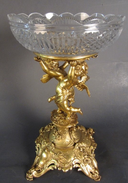 Dore over Bronze Figural Center Piece: Dore over bronze figural center piece with cut crystal bowl. French 19th Century Height: 18", Width: 11"
