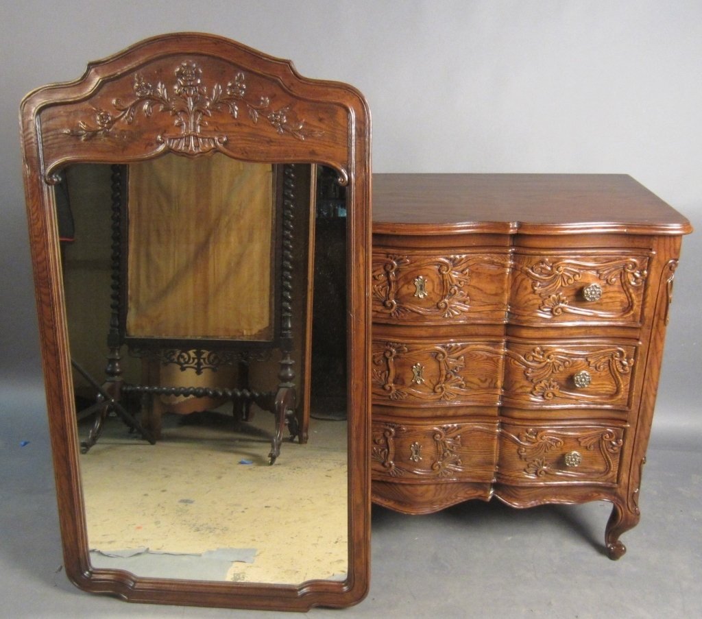 Henredon Dresser and Mirror: Ornate carved dresser and mirror by Henredon. Maker's mark stamped inside drawer: Four Centuries, Henredon Height of Dresser: 34 1/2", Width: 43 1/2"