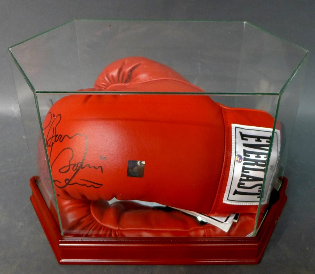 Ray Mancini Autographed Boxing Glove: Ray "Boom Boom" Mancini is a retired American boxer. He held the World Boxing Association lightweight championship from 1982 to 1984. This boxing glove comes with a certificate of authenticity. Height