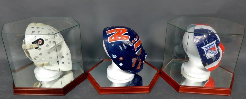 3 Goal Masks Replicas by Don Scott: Collection of 3 vintage style goal masks by artist Don Scott. These fiberglass reproductions of goalie masks worn by current and former NHL players are of the highest quality. Glenn (Chico Resch), Joh