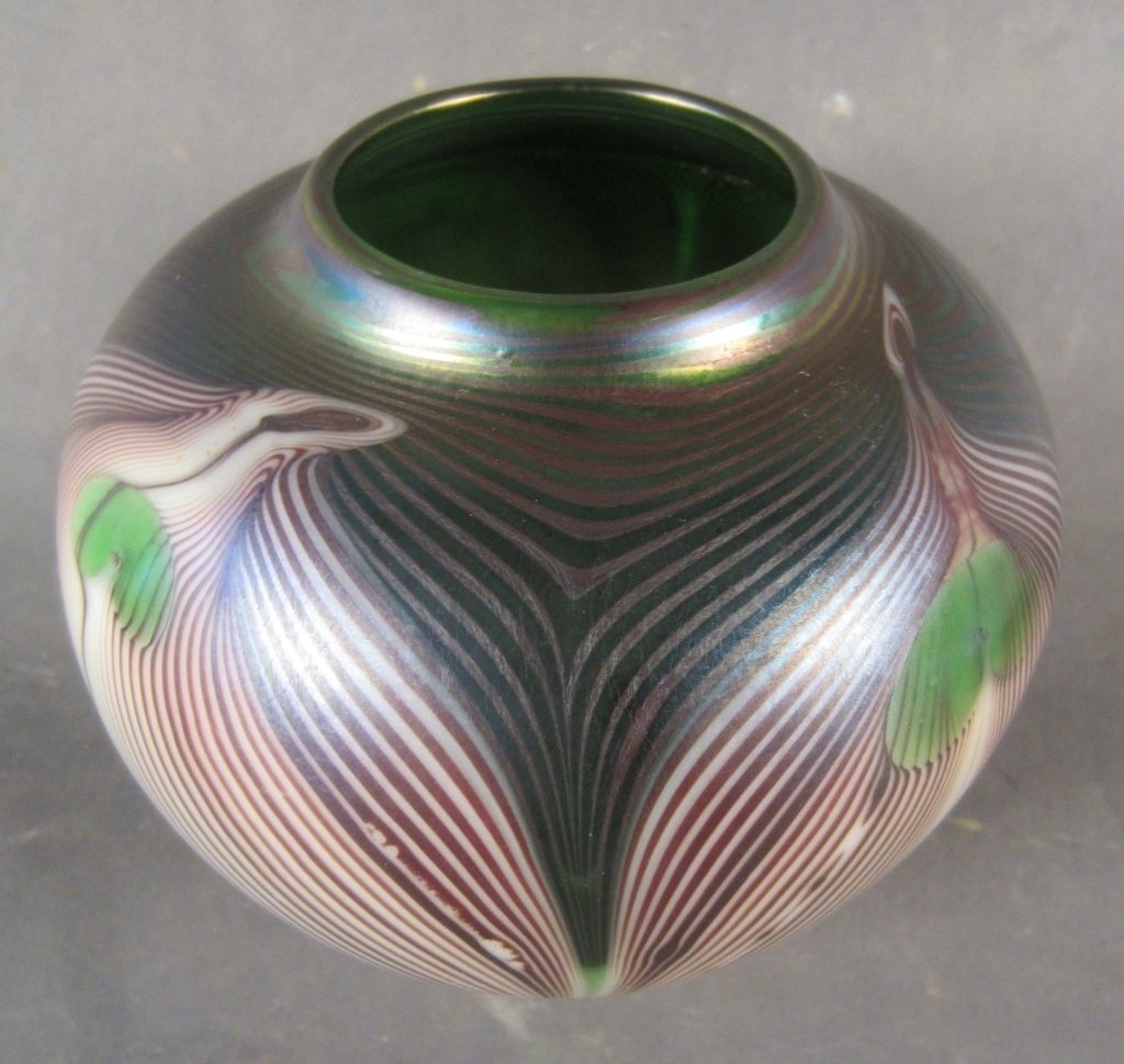 Beautiful Glass Vase: Green, purple and white vase with peacock feather motif Height: 5", Width: 5"