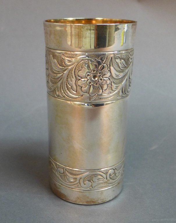 Sterling Silver Cup: Beautiful Sterling Silver cup with gold washed interior. Marked: Hadad 925. Height: 4 7/16", Width: 2 3/16". Approx weight: 121 grams.