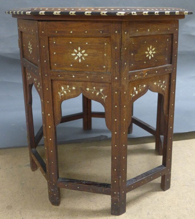 Indian Ebony & Bone Inlay Octagonal Table: Indian/ Moroccan style, ebony and bone inlaid octagonal accent table. missing some inlay. Height: 21", Width: 22"
