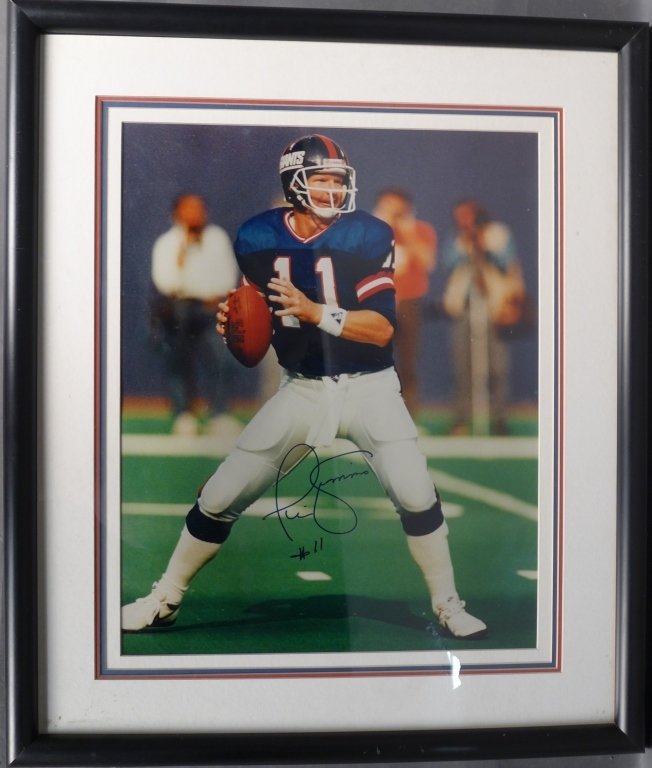 Phil Simms Autograph: Phillip Martin "Phil" Simms is a retired American football quarterback for the New York Giants. Phil Simms signed photograph comes with a certificate of authenticity. Height: 16", Width: 20"