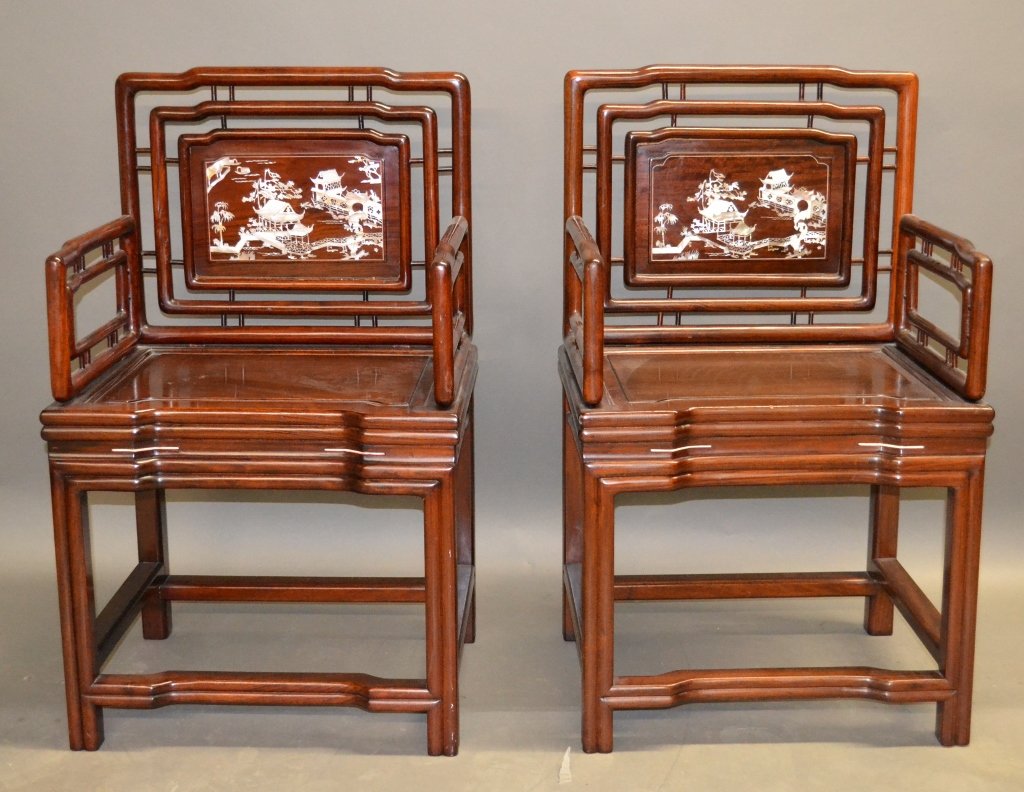 2 Chinese Rosewood/ Hardwood Chairs: Pair of Antique Chinese rosewood/ hardwood chairs with abalone shell inlay. Height: 36 1/2", Width: 22 1/4", Depth: 17 3/4"
