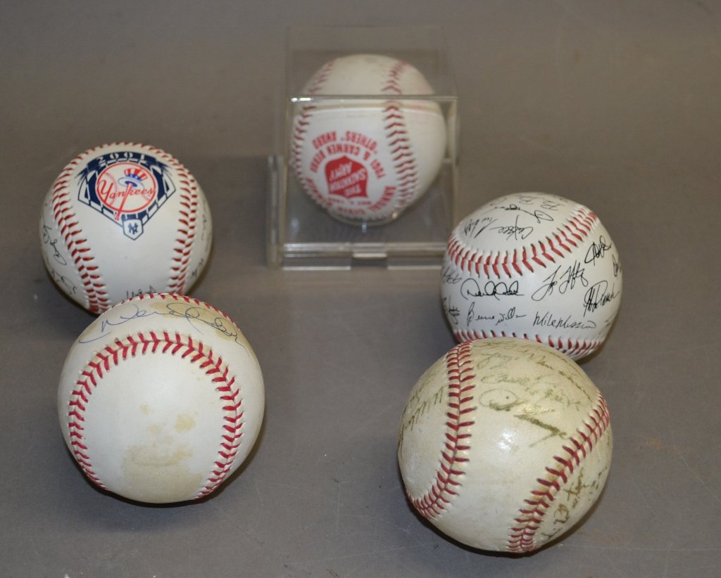 5 Autographed Baseballs: 5 signed/ autographed baseballs. Collection includes: 2 2001 Yankees balls and a 1999 Yogi & Carmen Berrra "others" award ball. Collection does not come with certs of authenticity.