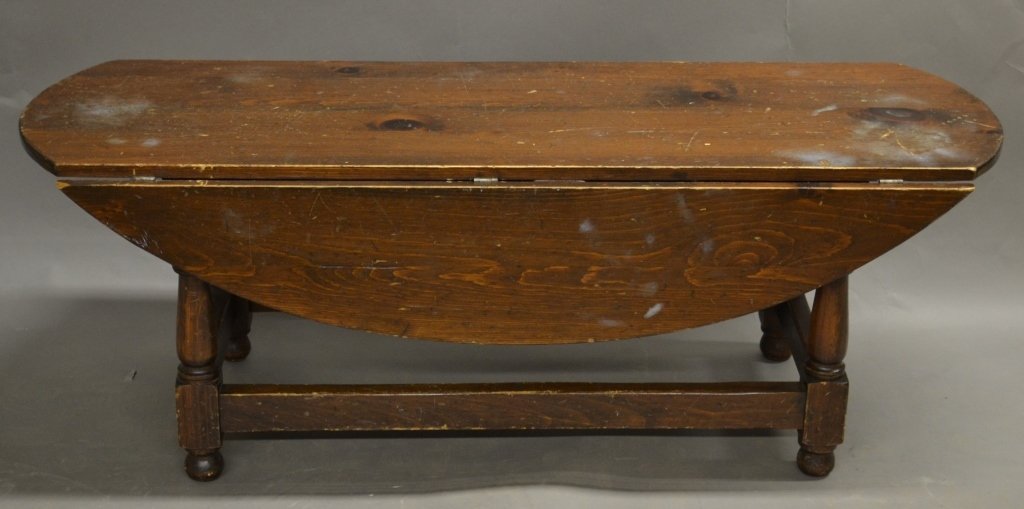 Drop Leaf Coffee Table: Drop leaf coffee table. Wood. 19 1/4" Height, 54" Width, 36 1/4 Depth.