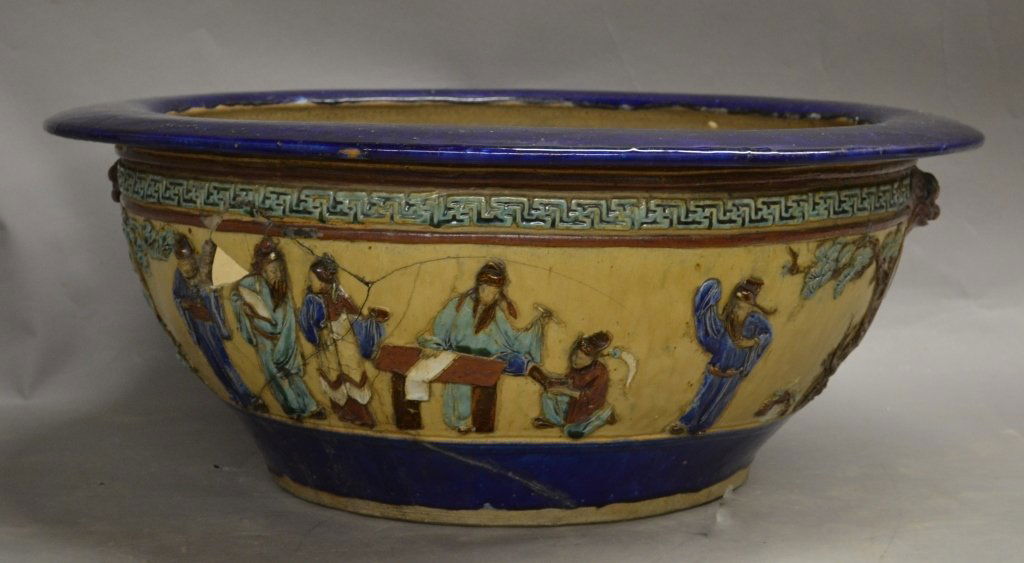 Chinese Glazed Earthenware Planter: Large glazed ceramic planter with Asian figural and floral scenes around. Some damages and old repairs. Height: 13", Width: 32"