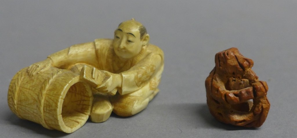 Japanese Netsuke: Japanese Netsuke signed figure and carved monkey. Netsuke signed on bottom. Height: 1 1/4", Width: 2 1/4", Depth: 1"