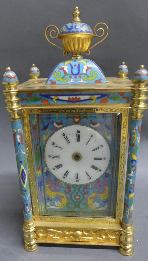Brass and Champleve Clock: Brass and champleve enamel mantel clock with beautifully painted sides. Clock hands and battery operated movement are unattached. Made in China. Height: 12", Width: 6"