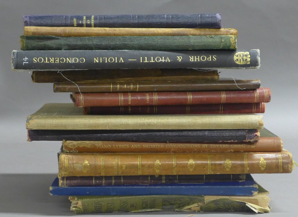 15 Antique Music Journals: From the Estate of Mark Falk. 15 bound journals containing sheet music by various composers. Stephen Heller, Hernrich Strobl and Louis Spohr are only some of the composers included in the books.