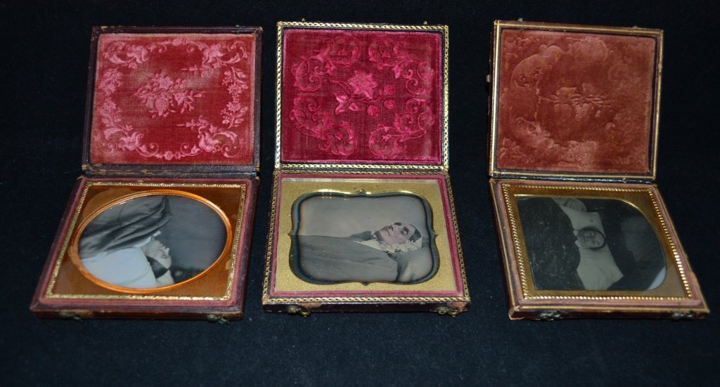 Victorian Post Mortem Ambrotype/ Daguerreotype: From the Estate of Mark Falk. Collection of 3 Sixth plate Ambrotype/ Daguerreotype of women with their heads resting on a pillows. All have gold mat and a red hued velvet pillow with floral design. He