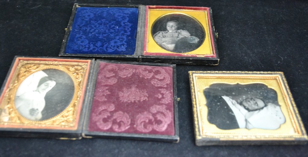 Victorian Post Mortem Ambrotype/ Daguerreotype: From the Estate of Mark Falk. Collection of 3 Sixth plate Ambrotype/ Daguerreotypes. All have gold mat. Two are in full cases with velvet pillows and the male figure is in a half case. Height: 3 3/4",
