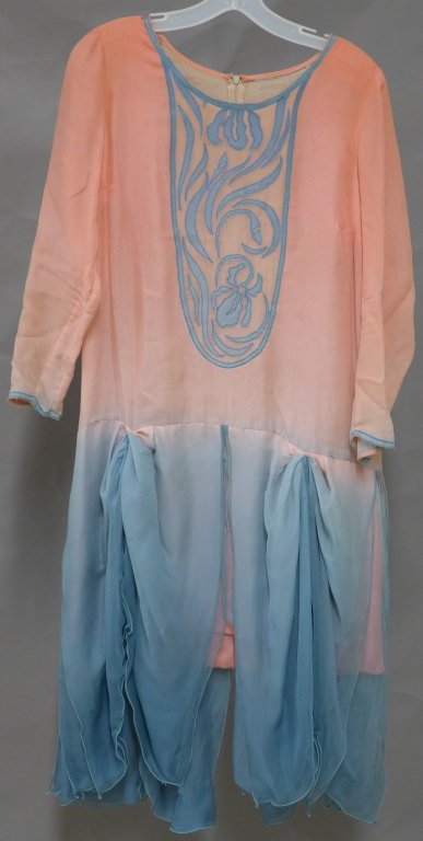 Floral Ombre Dress: Pink and blue ombre scarf dress with floral design on front, back and cuffs. Some loose threads and discoloration on skirt & sleeves. Length: 43", Waist: 36"