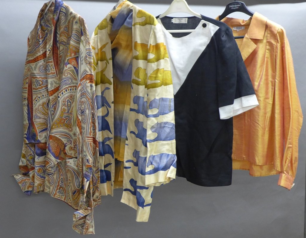 Collection of Woman's Shirts: Collection of 4 woman's shirts. Assorted sizes, colors and designers. Designers include: Escada, Miss V Valentino, Yves Saint Laurent, and Mary Ann Restivo. Some areas of discoloration.