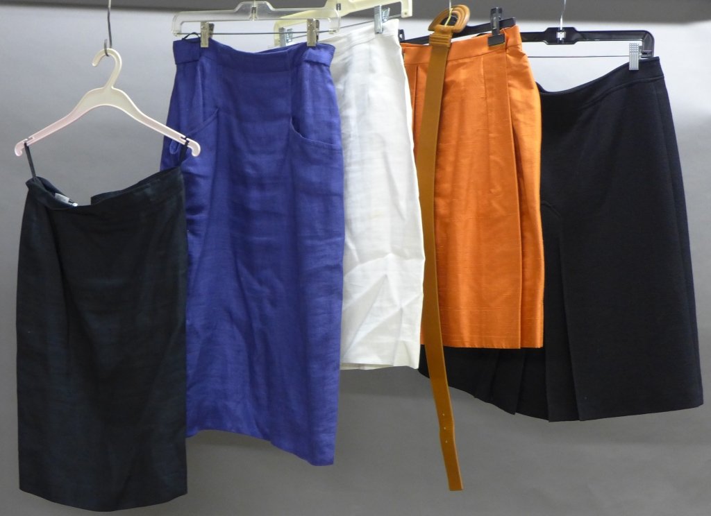 Collection of Woman's Skirts: 5 Skirts by assorted designers. Mixed sizes and colors. designers include: Burberry, Yves Saint Laurent, Valentino Miss V, Mary Ann Restivo, & Salvatore Ferragamo