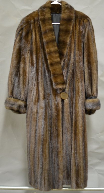 Fur Coat: Brown fur coat, possibly genuine mink. Large brown front button. Initial embroidered into inside lining. Great condition. Length: 52"