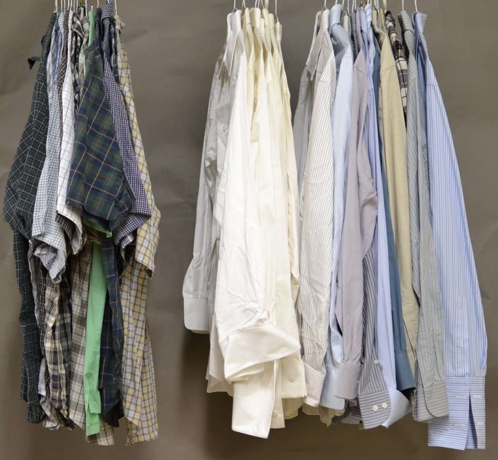 Casual and Dress Shirts: 15 short sleeve and 24 long sleeve casual and dress shirts. Assorted colors, sizes and styles. Some discoloration. Designers include: Armani, Giorgio Armani, Ralph Lauren and more.