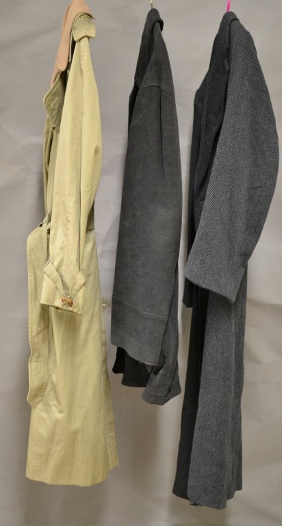 4 Men's Designer Coats: 2 Tan Burberry trench coats, 49" long. The Ermenegildo Zegna coat is 38" long. The Giorgio Armani is 51" long. They are all in good overall condition. They are assorted sizes and may have few discolor