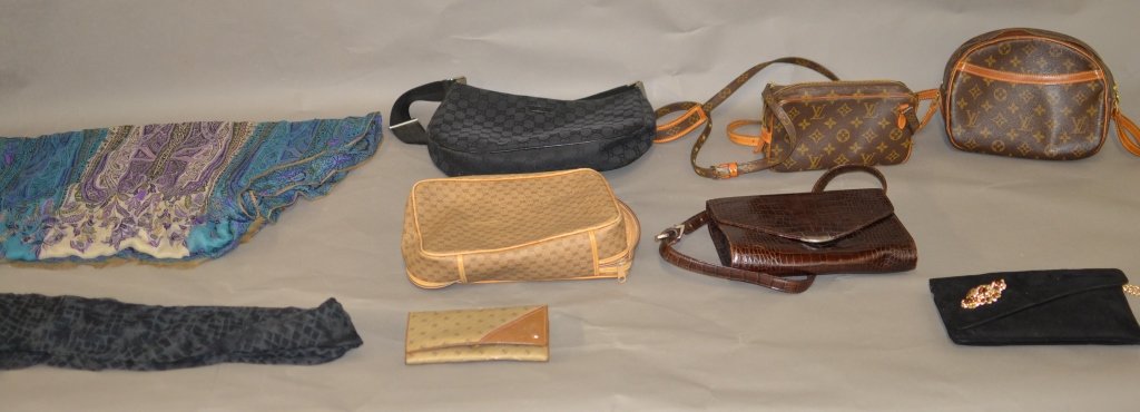 Designer Purses and Assesories: Possibly genuine Gucci, Ralph Lauren and Louis Vuitton included in this collection. 2 scarves (1 ETRO), 2 Gucci Bags, 1 Gucci wallet, 1 Ralph Lauren Croc bag, 1 Wahlberg, and 2 Louis Vuitton bags. Wea
