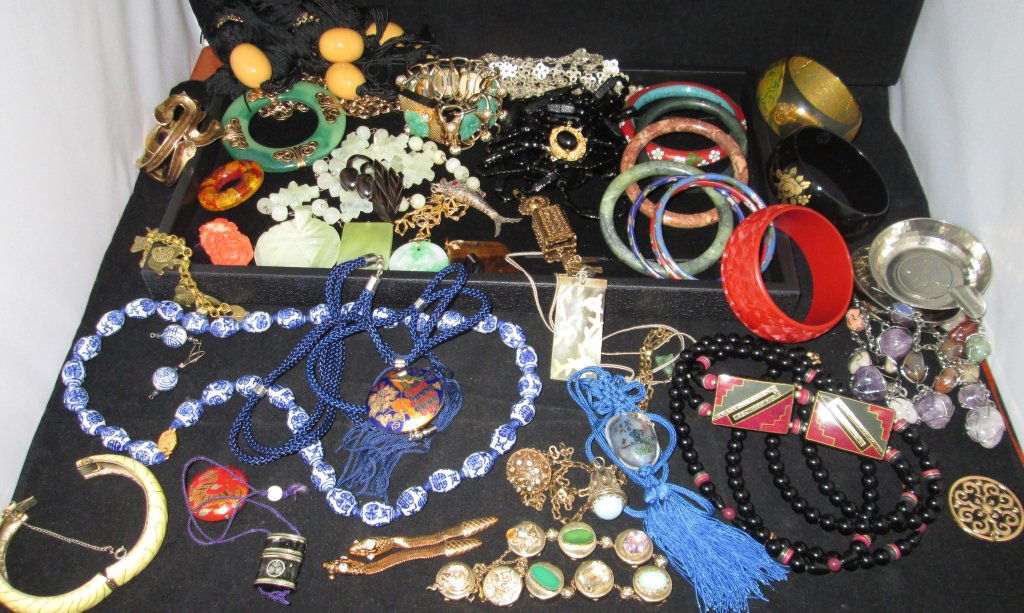 Collection of Asian Style Jewelry: Large array of Asian style jewelry. Collection includes: necklaces, pendants, bracelets, bangles and more. Jewelry is comprised of different natural stones, gemstones, enamel, wood, glass beads, metal