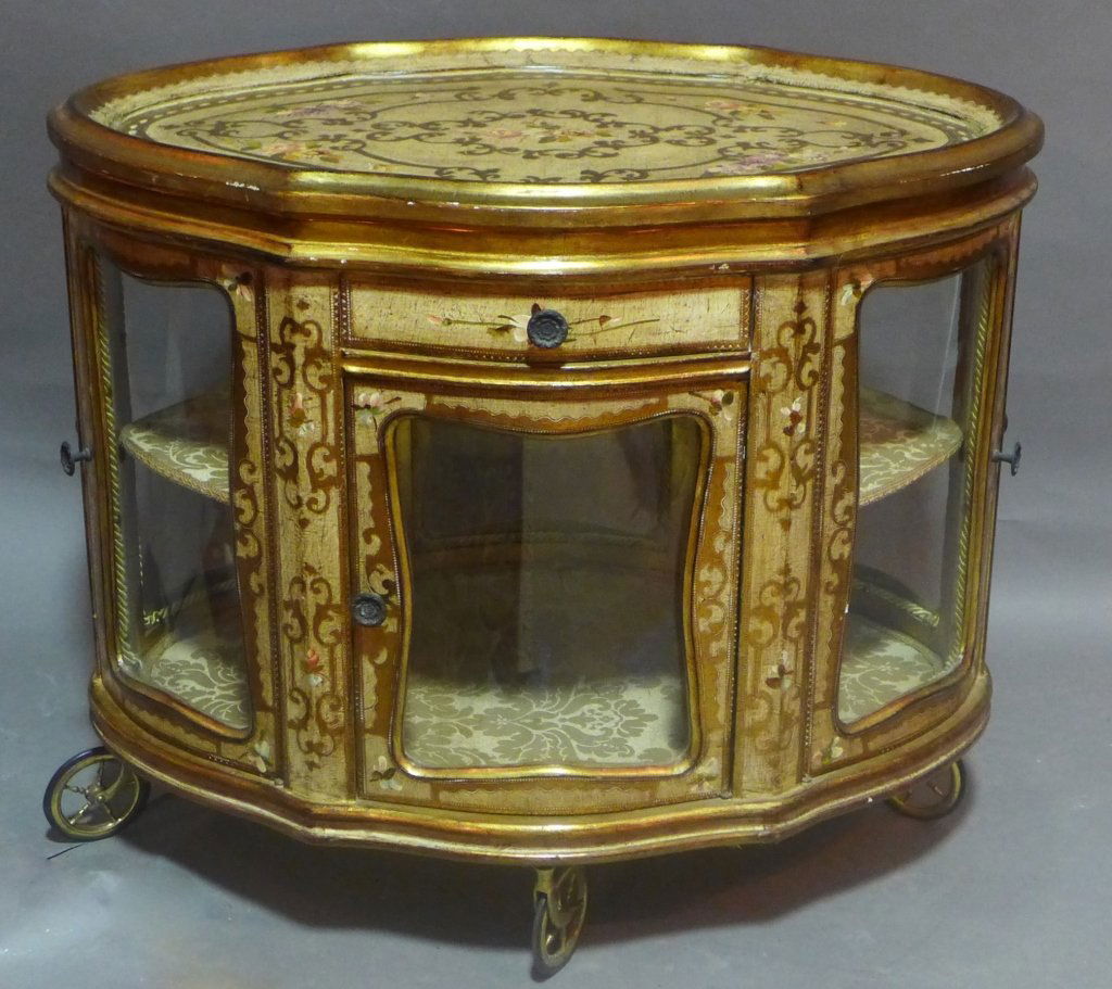 Hand Painted Italian Tea Cart: Antique 2 piece tea cart/ bar cart. Top tray sits on beautiful hand painted and gilt cart with curved glass panels. On swiveling wheels. Height: 29", Width: 33 1/2", Depth: 22"