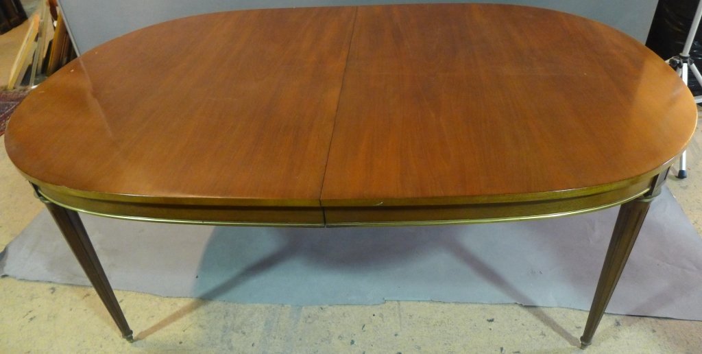 Dining Table, Louis XVI Style: Dining table with leaves. Gilt bronze mounts around table apron and on upper part of legs. Height: 30", Length: 72", Width: 46" & Leaf Length: 46", Width: 18"