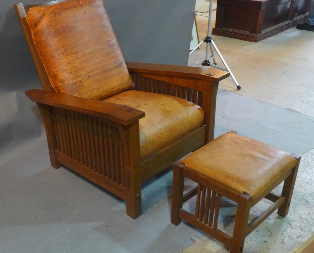 Stickley, Morris Chair: Stickley oak drop arm, Spindle Morris Chair and ottoman. Key & tennon construction. Height: 42", Width: 33", Depth: 37 1/2"