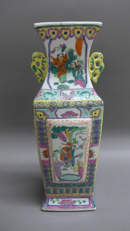 Famille Rose Porcelain Vase: Chinese famille rose porcelain square form vase with handles. Hand painted depicting different figural scenes on each side. Height: 16 3/4", Width: 5 3/4"