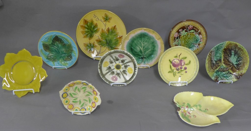 Decorative Plates: Collection of ceramic plates from around the world. Makers marks on bottom. Marks include: Etruscan Majolica and Carlton Ware. All in good condition, some firing imperfections. Yellow leaf plate Width