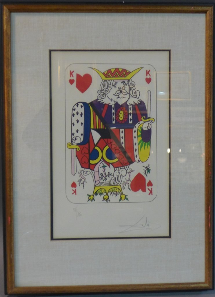 Salvador Dali, Spanish (1904- 1989): King of Hearts with bird and trees images representing the faces. Signed and numbered: 98/150. Lithograph with linen mat. Some wear to frame. Height: 30', Width: 21 3/4" & Image Size: Height: 19", Wid