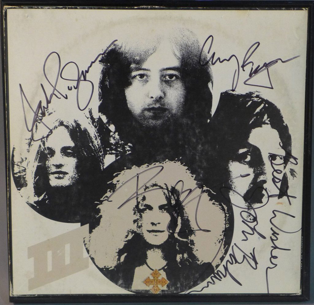 Signed Led Zepplin III Album: Led Zepplin III album with 4 signatures/ autographs. Included: guitarist Jimmy Page, singer Robert Plant, bassist and keyboardist John Paul Jones, and drummer John Bonham. Framed (no glass) Scuffs and